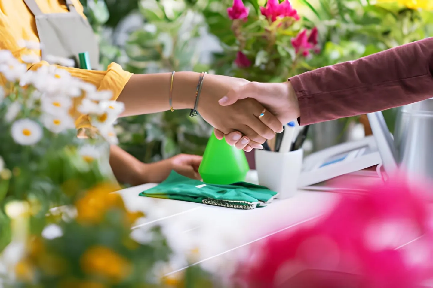 Handshake between a business owner and a new client
