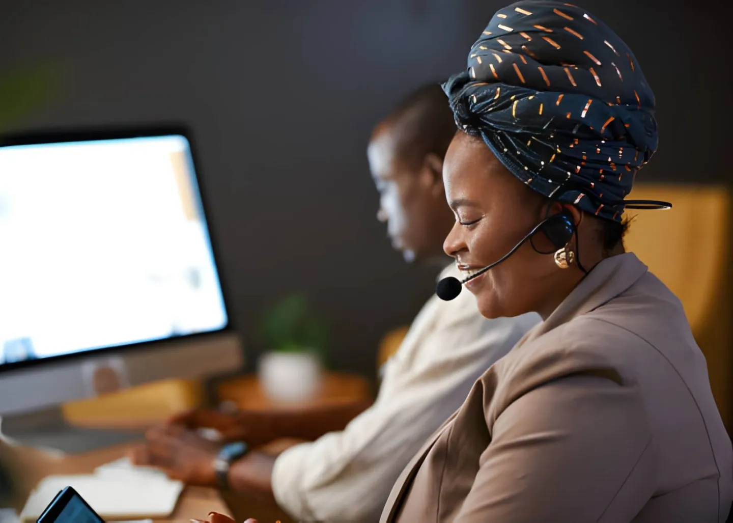 Support agent with a headset helping a customer fix a failed social media order